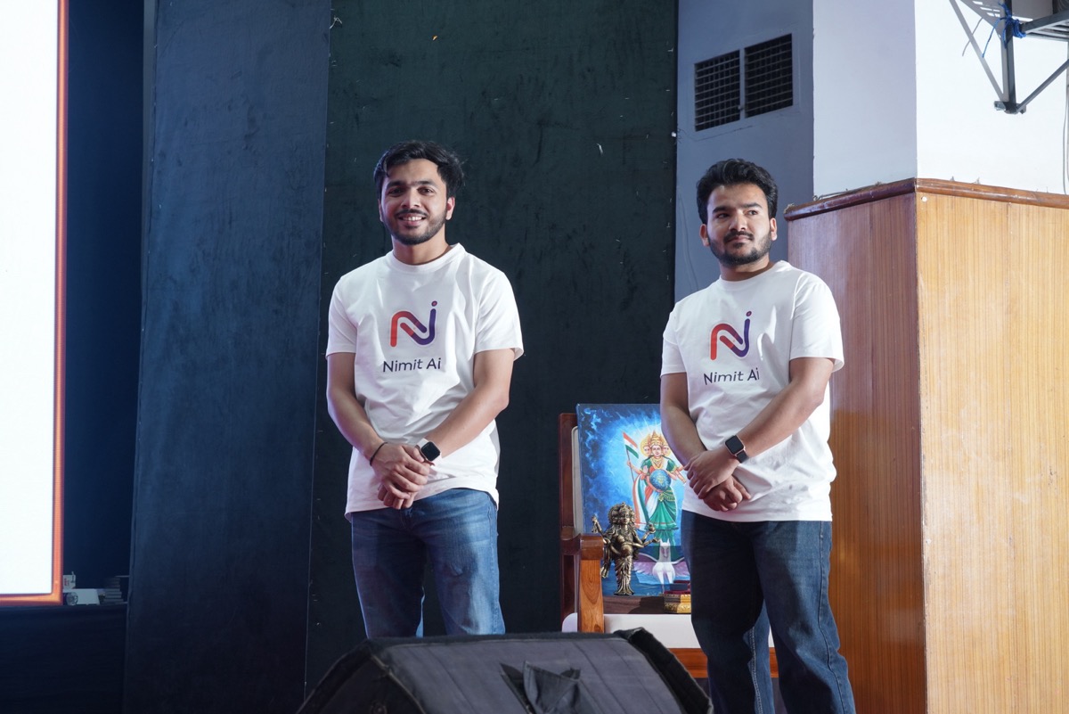 Stage setup at Innopreneurs Season 12, Viksit Bharat Conclave, RTMNU Nagpur, with finalists preparing to pitch